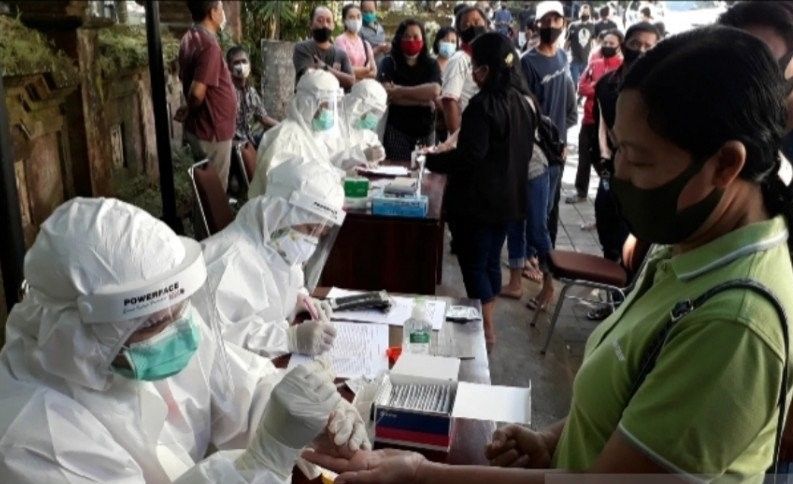 podiumnews.com-Jembrana Tunda Vaksinasi COVID-19 Hingga Bulan Depan